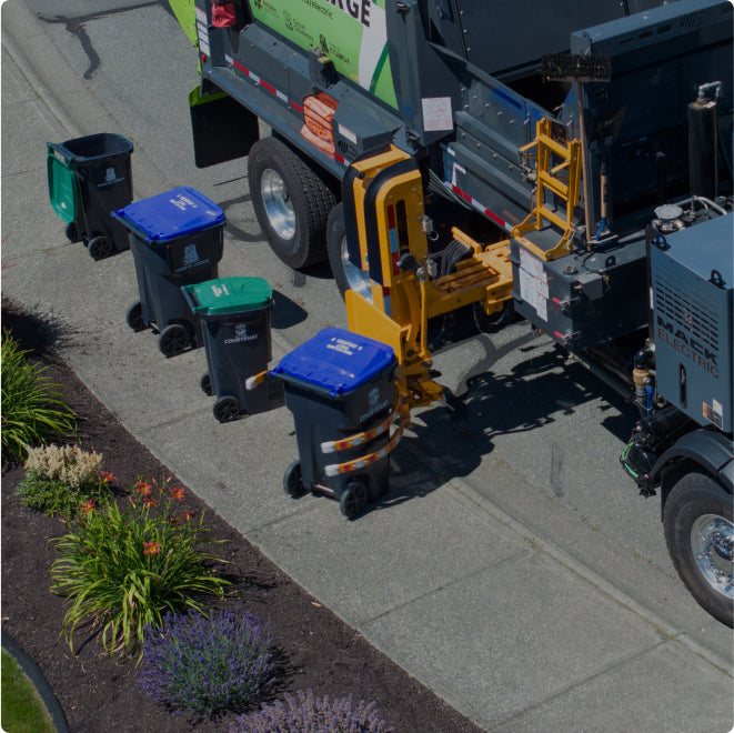 Waste bins being collected